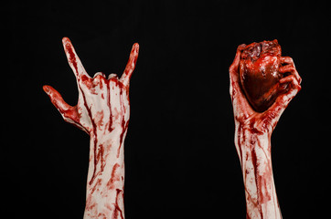 terrible bloody hand hold torn bleeding human heart isolated