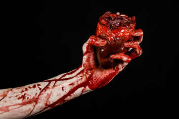 terrible bloody hand hold torn bleeding human heart isolated - 83552436