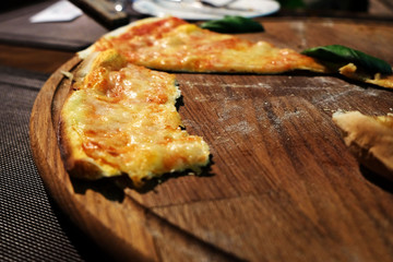 Piece of pizza on table close-up