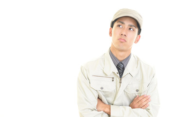 苦悩する作業員