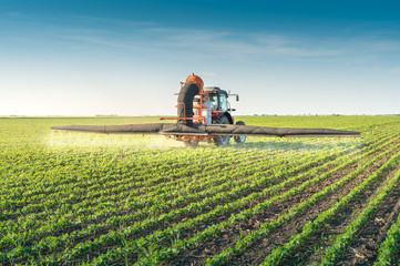tractor spraying pesticides