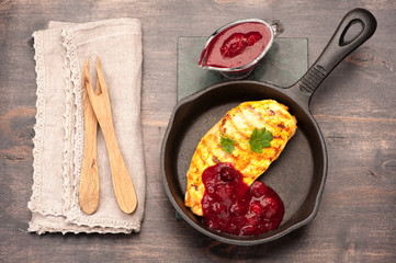Grilled chicken fillet with cranberry sauce