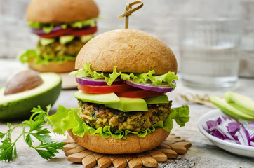 spicy vegan curry burgers with millet, chickpeas and herbs