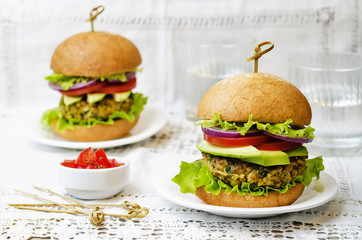 spicy vegan curry burgers with millet, chickpeas and herbs