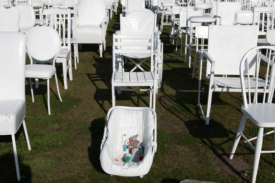 White chairs in memory of victims of earthquake 2010