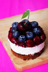 food dessert cupcakes with cherry and blueberry jam berry cream