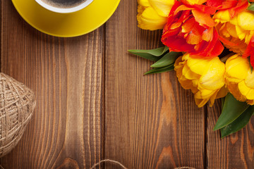 Colorful tulips and coffee cup