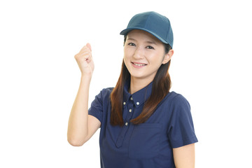 ガッツポーズの女性労働者