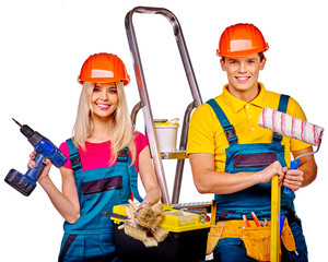 Couple builder  with construction tools.