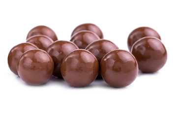 Chocolate candies on a white background.
