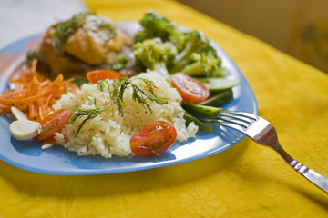 A plate of rice and vegetables