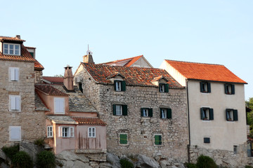 Fototapeta na wymiar Old traditional houses built on a cliff. In Split, Croatia.