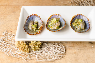 Grilled limpets, typical snack of Canary Islands.