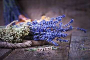 Herbs drying on the wooden table