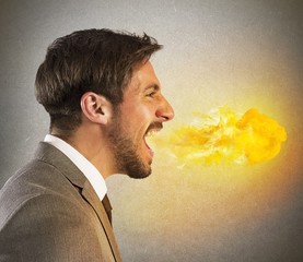 Businessman spits fire