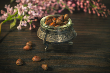 pine nuts in an ancient bowl