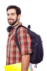 Close-up of a smiling student standing on white background