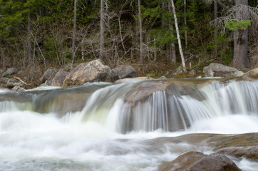 Water fall from river rocks
