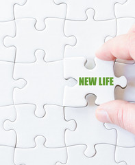 Puzzle piece with words New Life