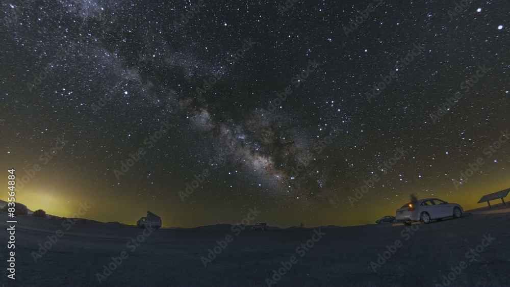 Wall mural dantes view, death valley night sky milky way timelapse