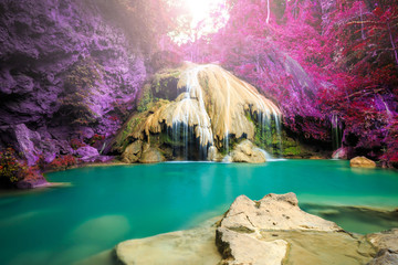 Fototapeta premium wonderful waterfall with colorful tree in thailand