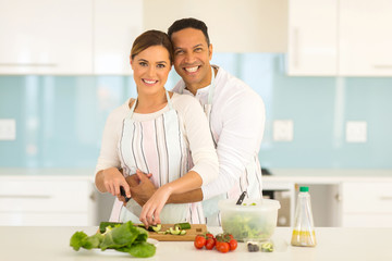 Obraz na płótnie Canvas couple have fun in modern kitchen