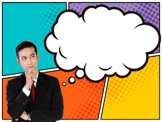 Young businessman looking up to thinking bubble in comic style