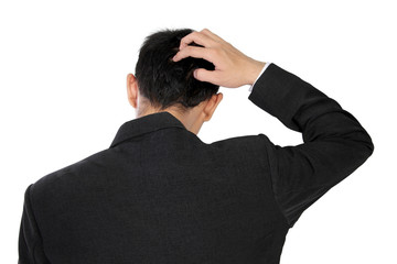 A man in suit scratching head in confusion, isolated on white