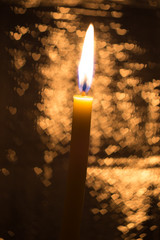 Candle with bokeh