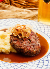 beef cutlet with mashed potatoes and cabbage