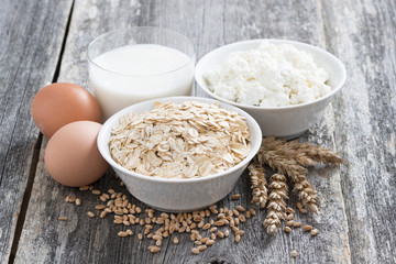 oatmeal, eggs, cottage cheese and glass of milk 