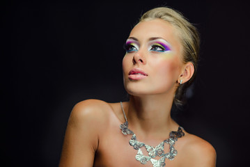 Girl model with professional makeup and hairstyle 