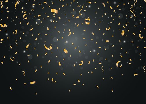 Golden confetti isolated on black background 