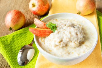 Oatmeal porridge with apple - obrazy, fototapety, plakaty