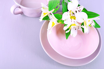 Table setting with flowers, closeup