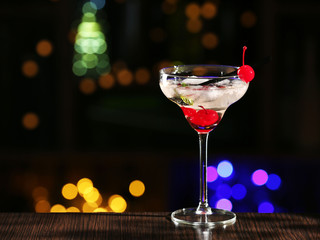 Glass of cocktails on bar background