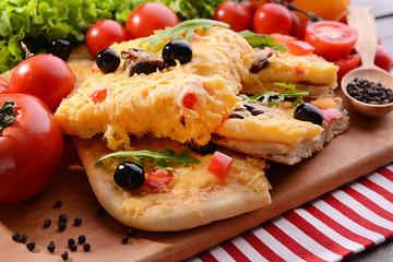 Delicious homemade pizza on table close-up