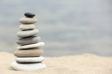 Deurstickers Stenen in het zand Zen stenen balans spa op het strand