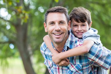 Father and son having fun in the park
