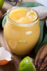 Homemade lime curd in glass jar