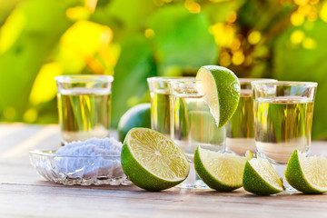 gold tequila with salt and lime