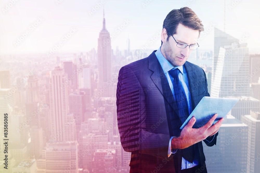 Poster Composite image of businessman using a tablet computer