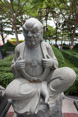 Fototapeta na wymiar Chinese statue in the Buddhist temple.