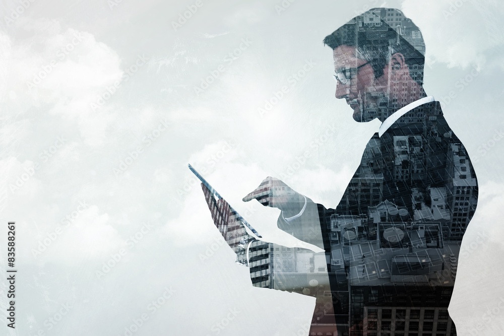 Poster composite image of mid section of a businessman touching tablet