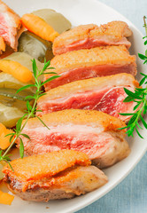 Baked duck breast with zucchini and carrots