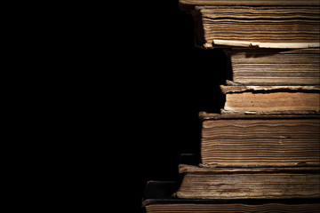 Old books in a stack with a place for text