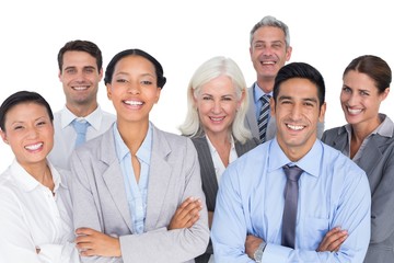 Business people looking at camera with arms crossed
