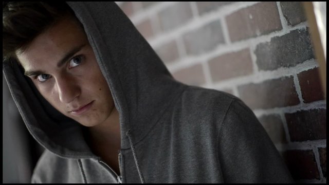 Teennager Boy in hooded top