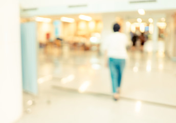 Naklejka premium Blurred waiting chairs zone in hospital,use as background