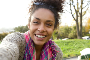 Selfie portrait of a smiling young woman